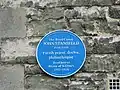.Blue plaque for John Stansfeld (1854–1939), Rector of St Ebbe's Church 1912–26, on the wall of the former St Ebbe's Rectory