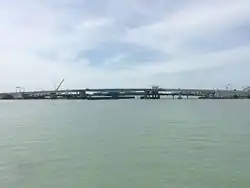 The current swing bridge with the original behind it prior to demolition