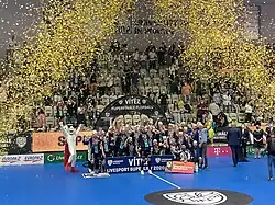 Men's team celebrating the championship title in the 2020–21 season.
