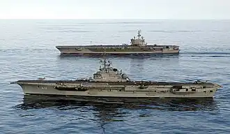 São Paulo (foreground) and USS&nbsp;Ronald Reagan during a combined training exercise in June 2004