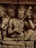Hindu, Buddhist. Brodobudur, second gallery, main wall. Lute with frets