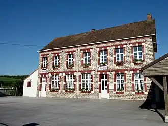 The town hall and school of Brunembert