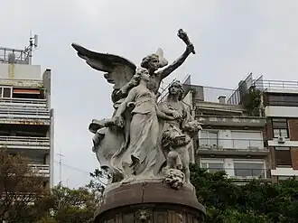 Detail of the Monument of France to Argentina, featuring national personifications of the two countries holding hands.