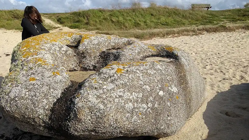 A set of bullaun on Brignogan-Plages, Brittany; erosion or art?