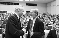 Modrow congratulating his successor, Lothar de Maizière, on his election as Minister-President