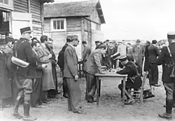 Photo of French police registering victims of the Green Ticket Roundup at Pithiviers camp