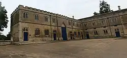 Stables with Forecourt Railings and Service Wings and Servants Wing, Brewery and Porters Lodge at Burghley House