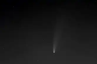 Talitha Borealis in conjunction with the comet C/2020 F3 (NEOWISE) on 18 July 2020 21:30 UTC with an attitude von 17° above the north horizon of Berlin (image height = 4°). At the lower edge of the picture, a bit left from the centre there is the neighbour star Alkaphrah (Kappa Ursae Majoris respectively Talitha Australis). The distance between Talitha Borealis and C/2020 F3 was seven arc minutes.