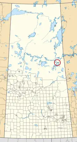 A map of the province of Saskatchewan showing 297 rural municipalities and hundreds of small Indian reserves. One is highlighted with a red circle.