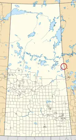 A map of the province of Saskatchewan showing 297 rural municipalities and hundreds of small Indian reserves. One is highlighted with a red circle.