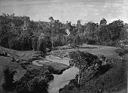 Encampment by a river in the Karo heights, Sumatra (1870)