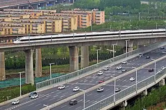 CRH6A-0422 on Zhengkai ICR passing over E. 3rd Ring Road 20190412 02.jpg