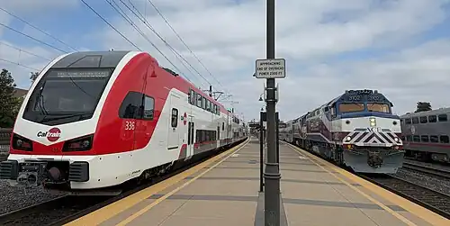Caltrain and ACE at Santa Clara; the platform display on the right is for Capitol Corridor