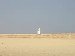 The lighthouse and the headland facing about southwest and the point