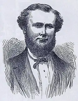 smiling middle-aged man with a jawline beard