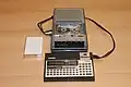 PB-110 Databank calculator with external tape recorder dock