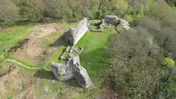 A ruined wall on a hilltop