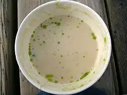 Cauliflower cheese soup prepared with blue cheese, topped with olive oil