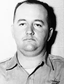 Black-and-white mug shot of Price