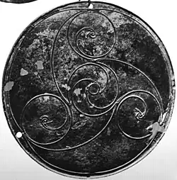 Bann disc, bronze with triskele decoration