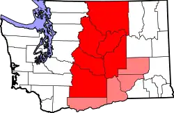Map of Central Washington. Counties highlighted in red are always included, while counties highlighted in pink are sometimes included.