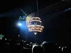 The chandelier in The Phantom of the Opera is featured in a moment of spectacle during the musical.