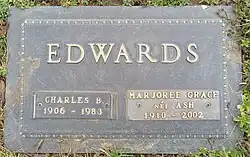 Flat bronze plaque including information for him and his wife