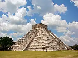 El Castillo being climbed by tourists