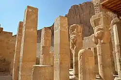 Tall stone columns arranged in rows