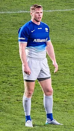 Chris Ashton wearing a Saracens F.C. Saracens blue jersey in 2015