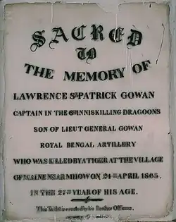 This inscription on white marble is in memory of an officer killed by a tiger at the village of Maine (now known as Men), south of Mhow.