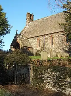 The west part of a stone church with a bellcote
