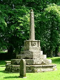 Stone churchyard cross in St Aldhelm's parish churchyard