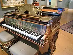 1884 Steinway grand piano designed by Sir Lawrence Alma-Tadema with painted panel by Sir Edward Poynter[c]