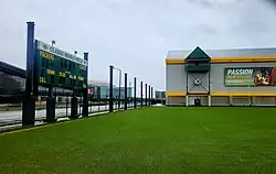 Black and white photo of football players on a field