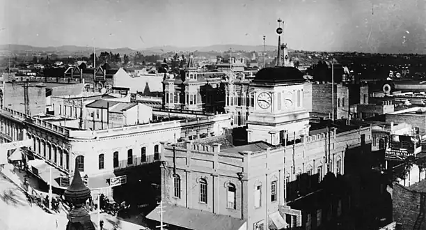 View from Spring St. of Clocktower Courthouse (r), southside of Temple Block (l), United States Hotel (back)