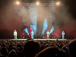 Collabro performing at Sheffield City Hall on 7 June 2025 (L to R: Lambert, Pagan, Auger and Redgrave)