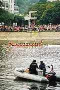 Marine Police supervises the dragonboat races in Shing Mun River Channel, Sha Tin. [dubious – discuss]