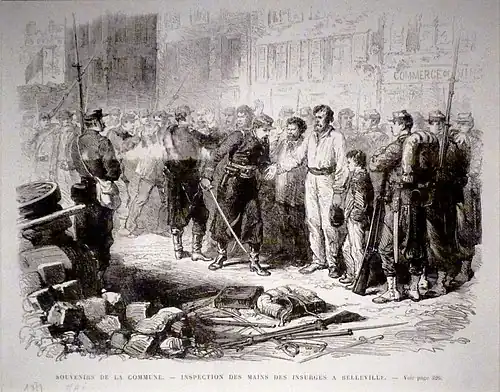 Soldiers check the hands of prisoners in Belleville to see if they had fired weapons.