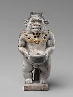 Cosmetic container; 525–404 BC; faience; height: 9.2 cm, width: 4.4 cm; Metropolitan Museum of Art