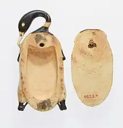 Cosmetic dish in the shape of a trussed duck; 1353–1327 BC; hippopotamus ivory (tinted); duck (left), length: 9.5&nbsp;cm, width: 4.6&nbsp;cm; cover (right), length: 7.3&nbsp;cm, width: 4&nbsp;cm; Metropolitan Museum of Art