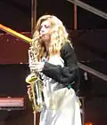 Benedicta Boccoli and her sax in Crimini del Cuore, 1 May 2015.[19]