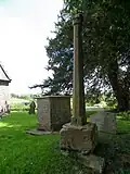 Cross in the churchyard of St John the Baptist 15&nbsp;m south east of the church door