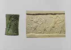 Cylinder seal and modern impression – bull-man combatting lion; nude hero combatting water buffalo; 2250–2150 BC; albite; height: 3.4 cm, diameter: 2.3 cm; Metropolitan Museum of Art (New York City)