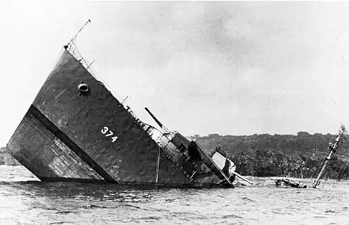 USS&nbsp;Tucker, a Mahan-class destroyer, sinking after striking a mine while escorting a cargo ship into New Hebrides, 1942