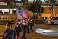 Police officers ran across the road and raised a purple flag after someone chanted Liberate Hong Kong to warn that the slogan might violate the national security law.