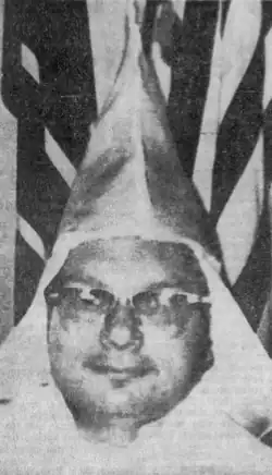 Black and white photo of Burros in Klan robes