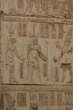 Roman emperor as pharaoh making offerings to Isis and Osiris