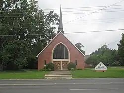 Delhi United Methodist Church is located across the street from Delhi High School.