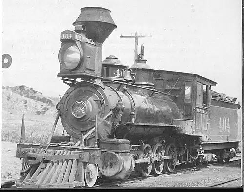 Denver & Rio Grande RR #404, 2-8-0, C-19. This photo shows what D&RG and RGS engines of this type (2-8-0) typically looked like in their original configurations, with diamond stack, box headlight, trim on the domes, and wooden pilot (cowcatcher). Photo courtesy Colorado Railroad Museum, Golden, Colorado.